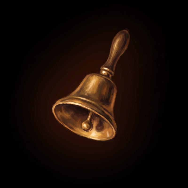 A small brass hand bell